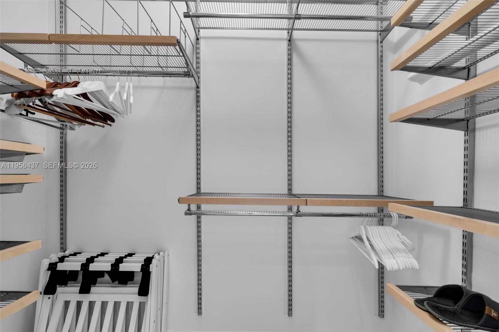 785 Crandon Boulevard, Unit 702 Key Biscayne, FL 33149 - Photo 19 of 41 a view of a room with racks on the wall