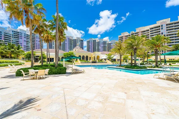 a view of a building with a swimming pool