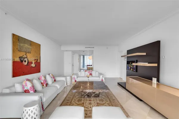 a living room with furniture and a couch