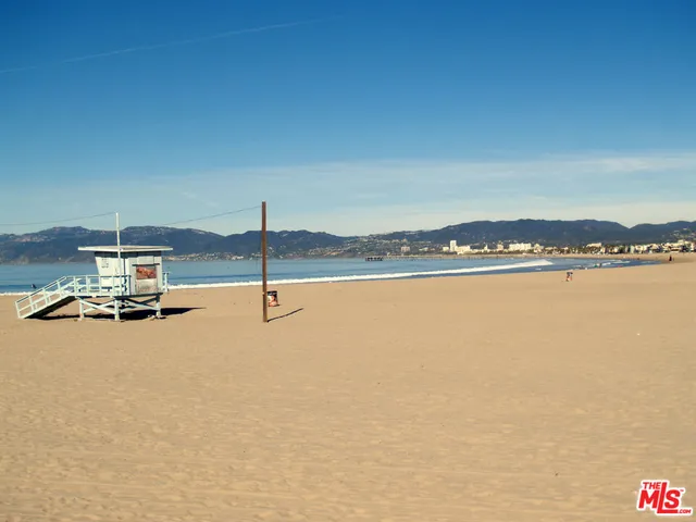 a view of a lake and a car parked