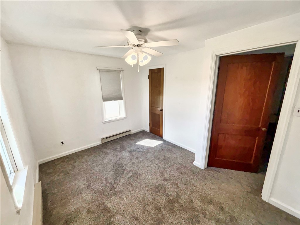 8411 Pitsburg-Laura Road Arcanum, OH 45304 - Photo 9 of 16 Bright and airy, this room features ample natural light and a comfortable feel.