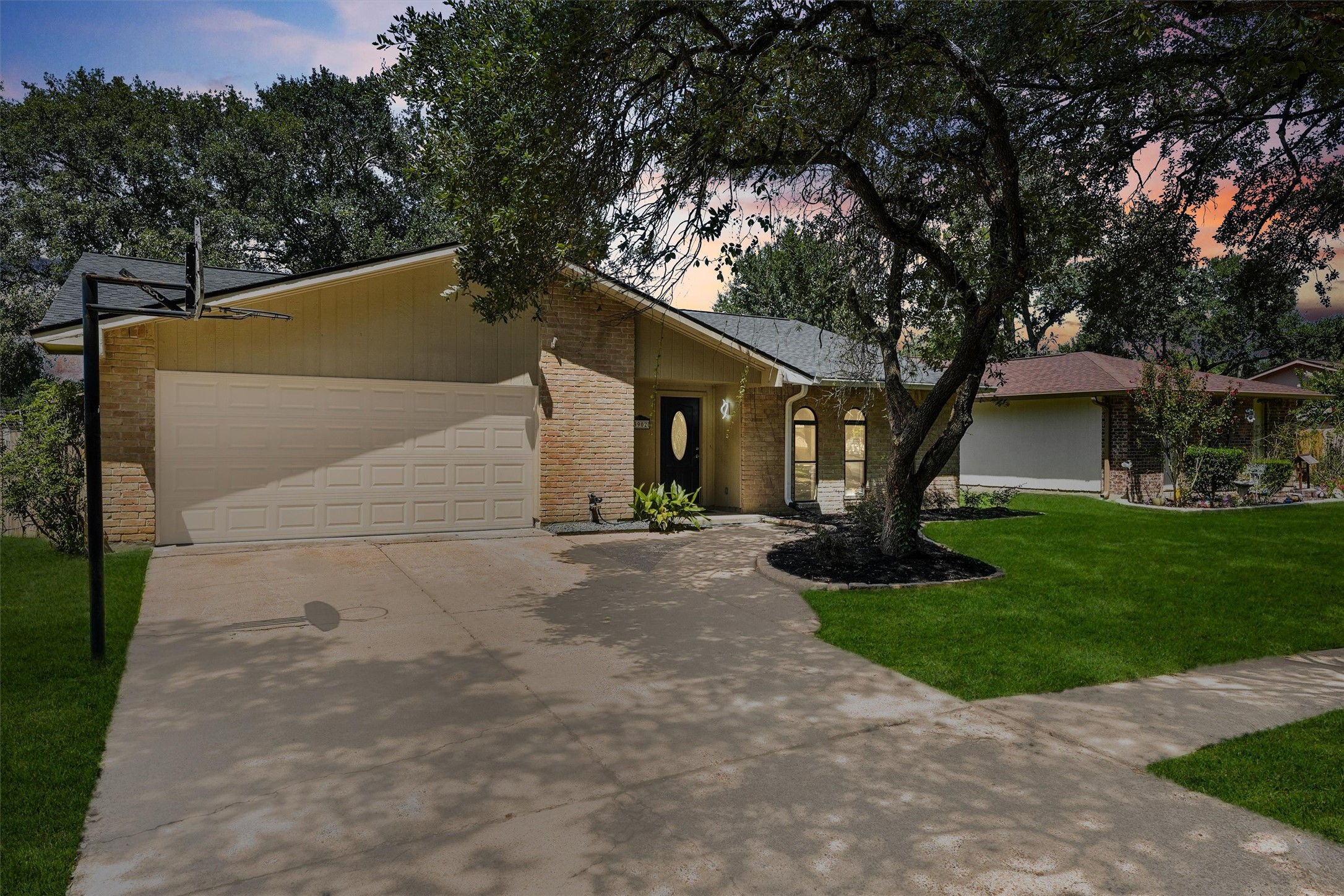 3902 Marywood Drive Spring, TX 77388 - Photo 1 of 29 a front view of a house with a yard and garage
