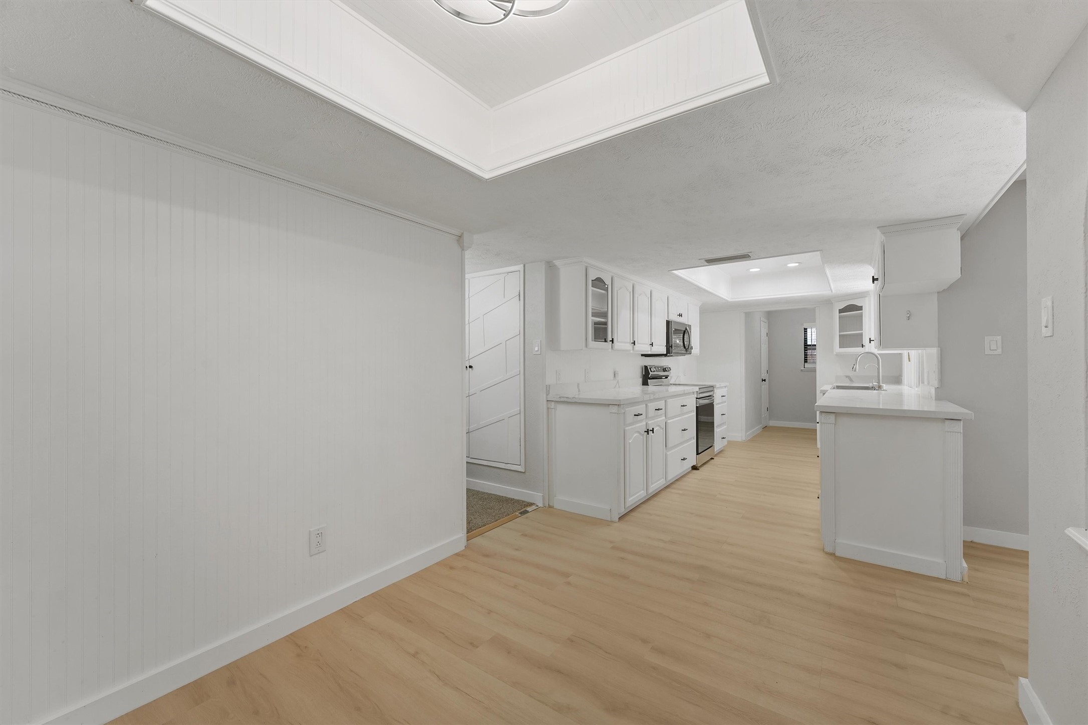 3902 Marywood Drive Spring, TX 77388 - Photo 17 of 29 a view of a kitchen with white cabinets