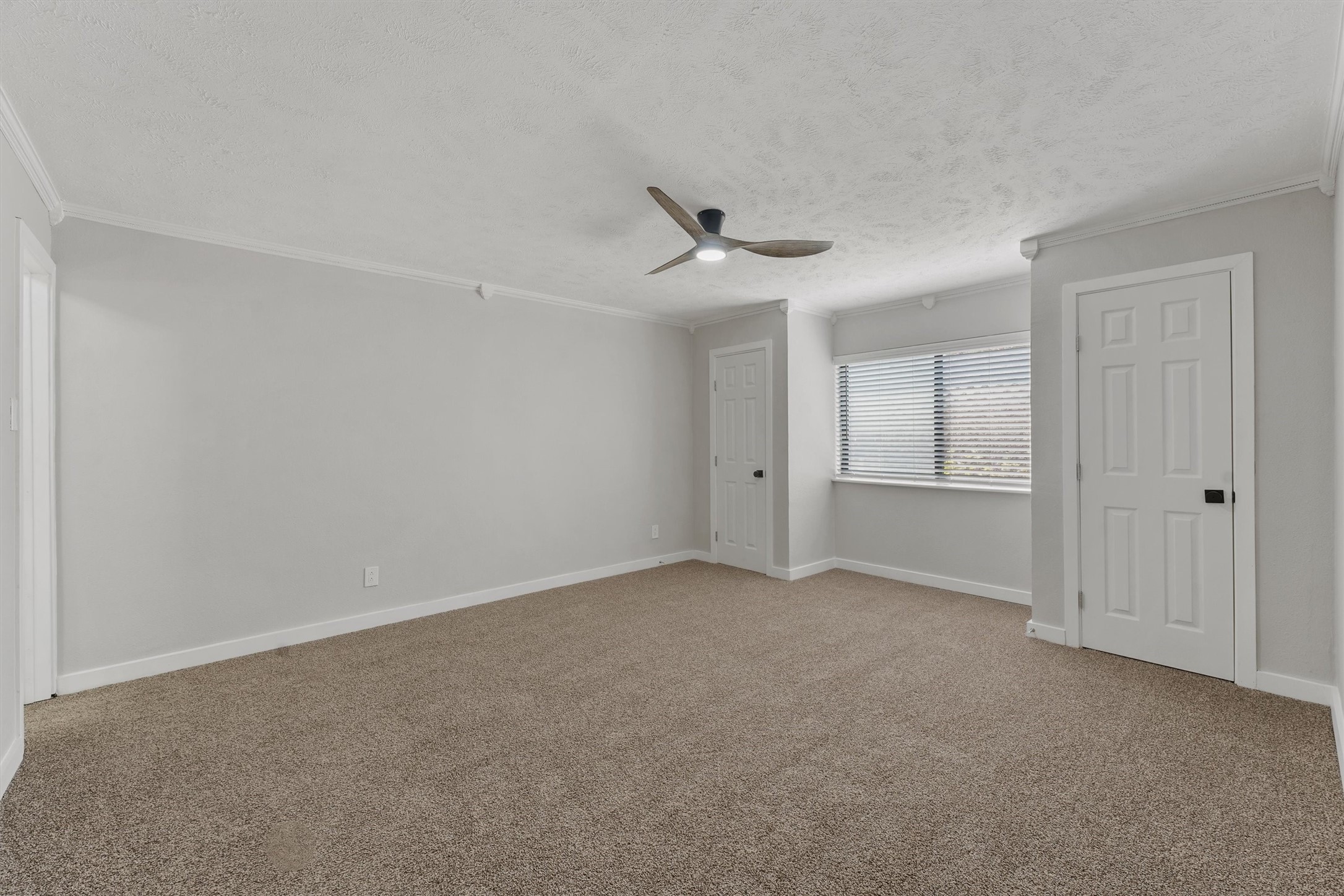3902 Marywood Drive Spring, TX 77388 - Photo 20 of 29 a view of an empty room and a ceiling fan