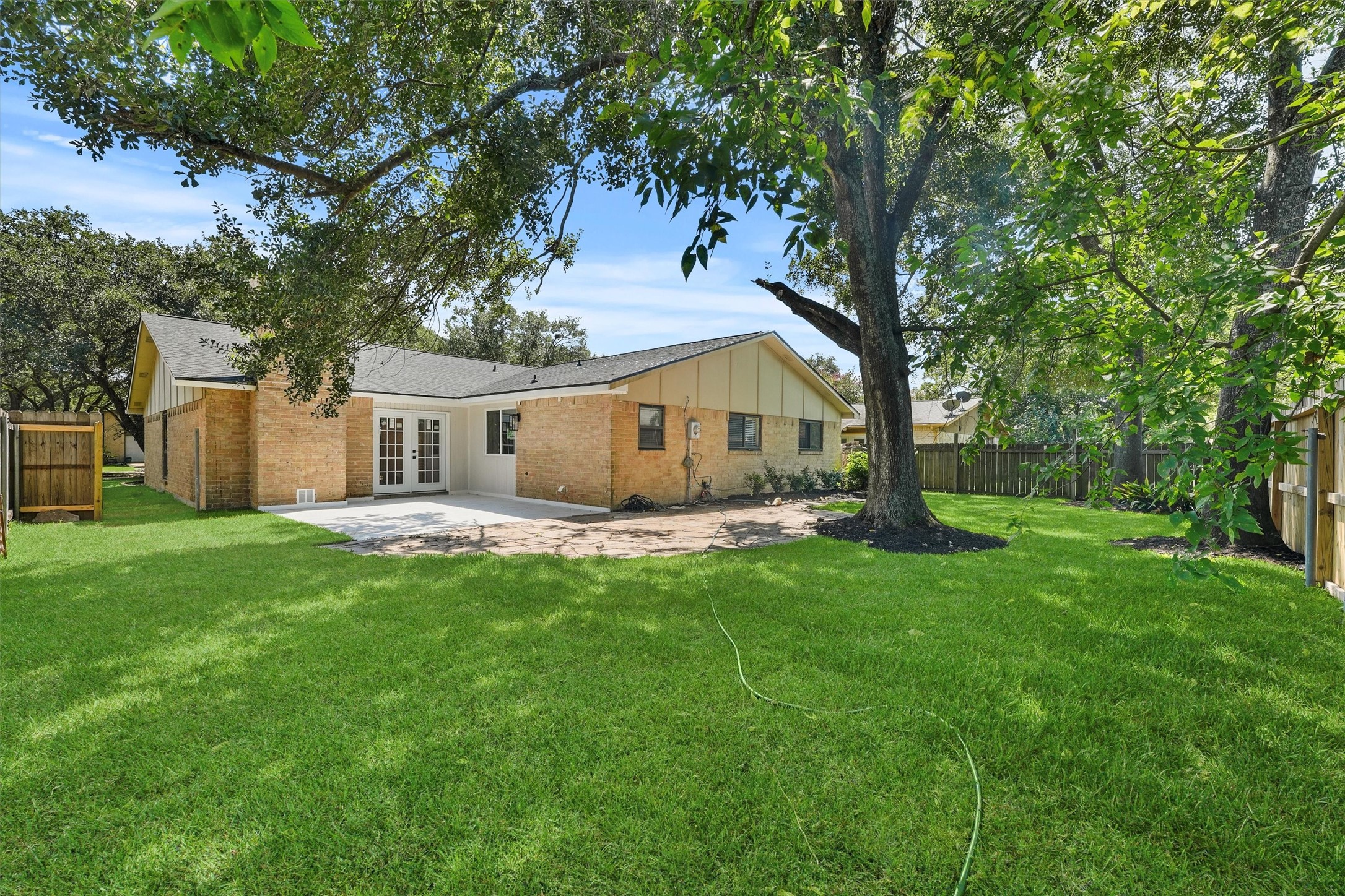 3902 Marywood Drive Spring, TX 77388 - Photo 28 of 29 a view of a house with backyard and a tree