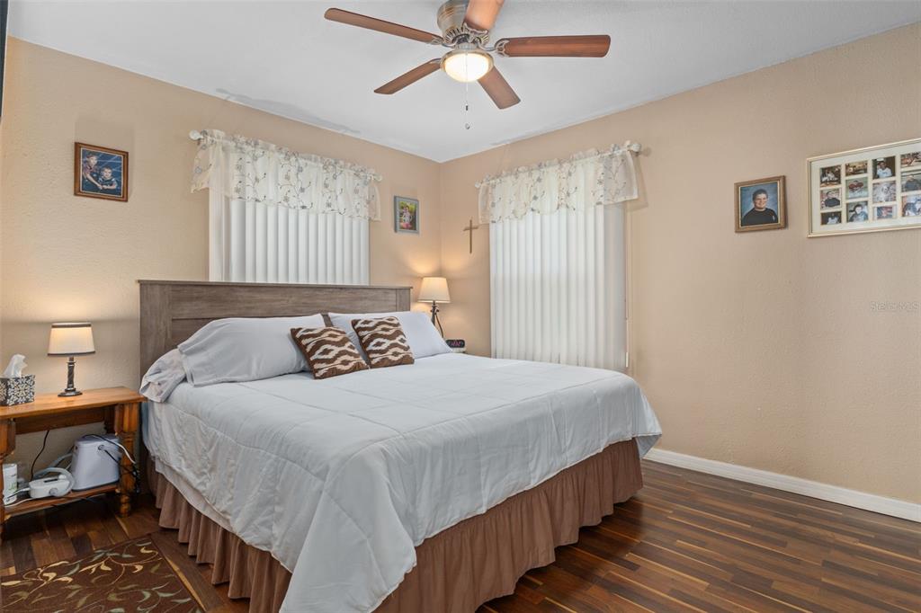 6185 West Riverbend Road Dunnellon, FL 34433 - Photo 20 of 49 a bedroom with bed and window