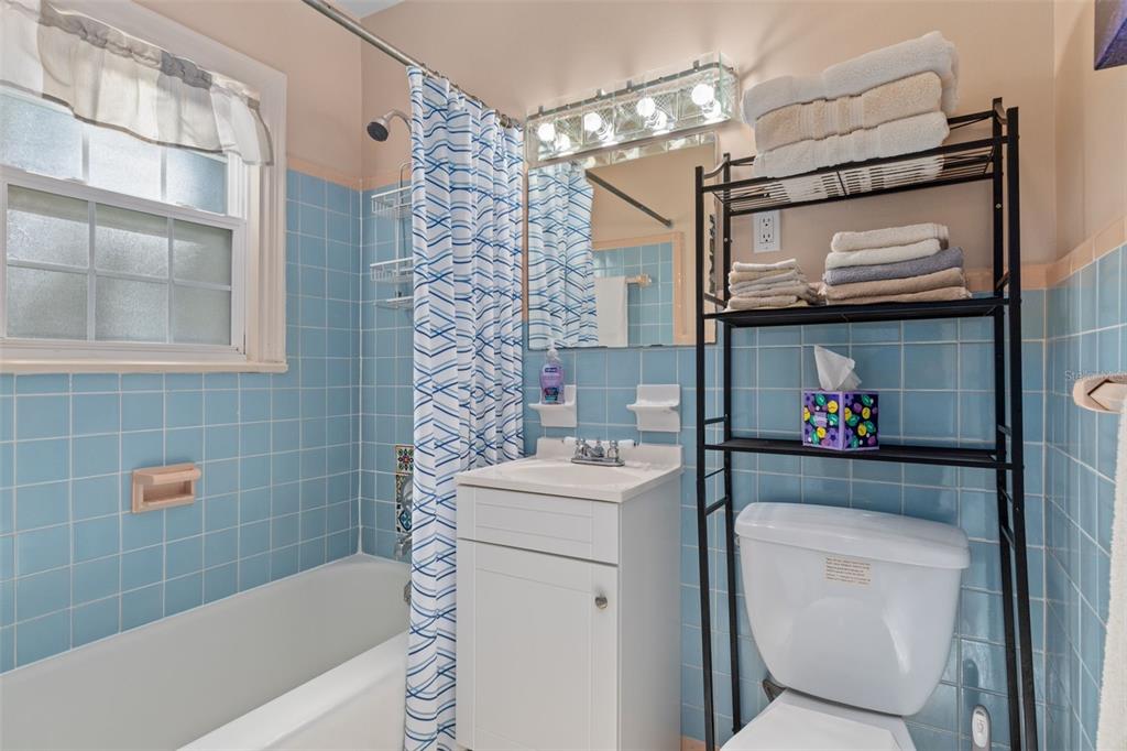 6185 West Riverbend Road Dunnellon, FL 34433 - Photo 22 of 49 a bathroom with a sink a toilet and shower