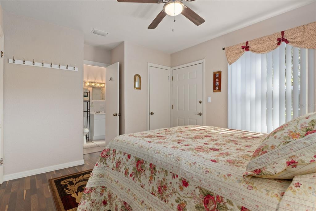 6185 West Riverbend Road Dunnellon, FL 34433 - Photo 24 of 49 a bedroom with a bed and a dresser