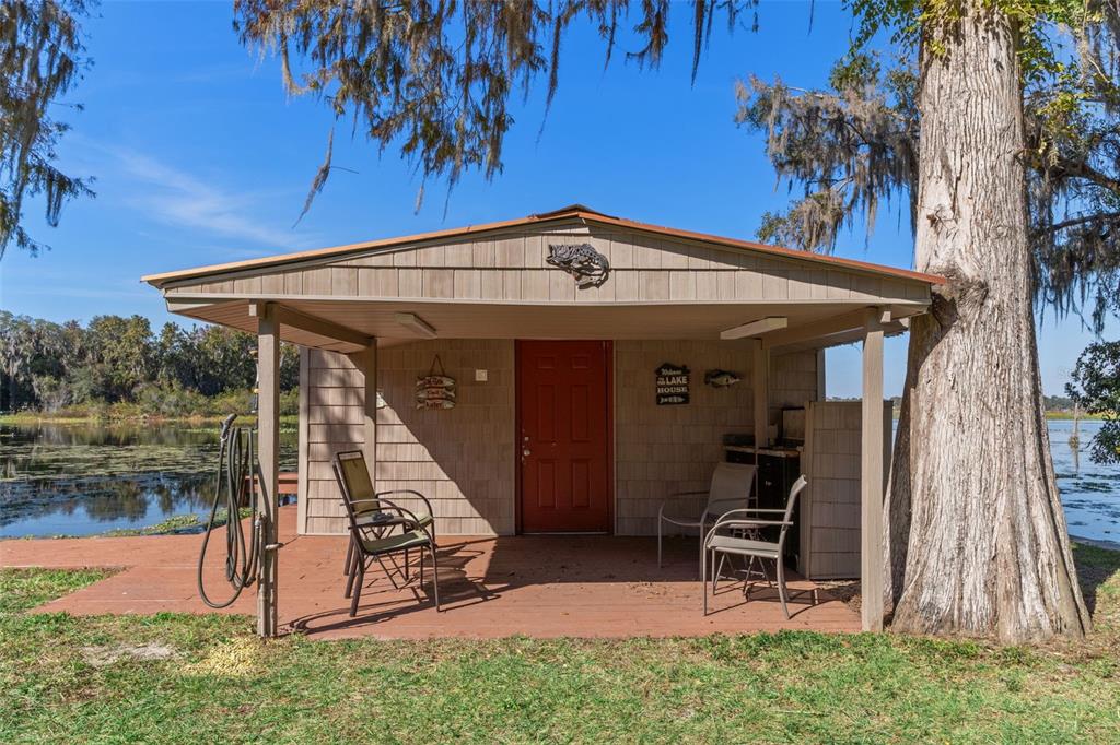 6185 West Riverbend Road Dunnellon, FL 34433 - Photo 40 of 49 a view of a house with a yard