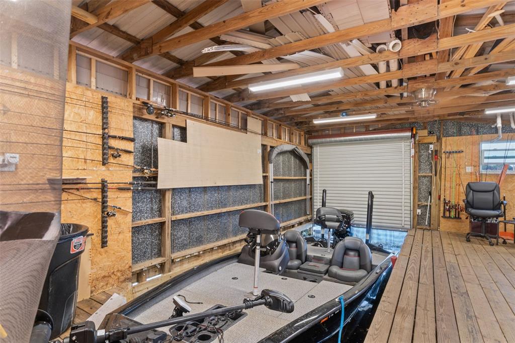 6185 West Riverbend Road Dunnellon, FL 34433 - Photo 41 of 49 a view of a chairs and table on the deck
