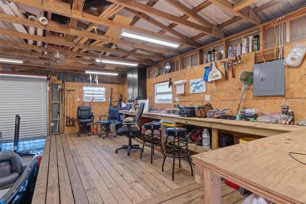 6185 West Riverbend Road Dunnellon, FL 34433 - Photo 42 of 49 a view of a patio with table and chairs