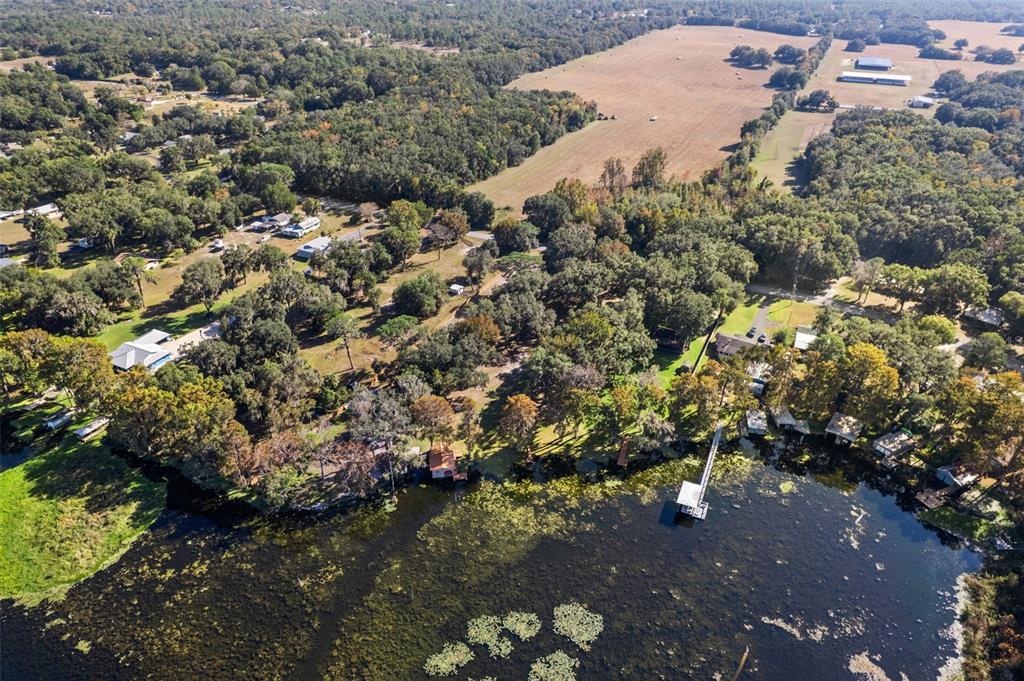6185 West Riverbend Road Dunnellon, FL 34433 - Photo 47 of 49 an aerial view of a house with a yard