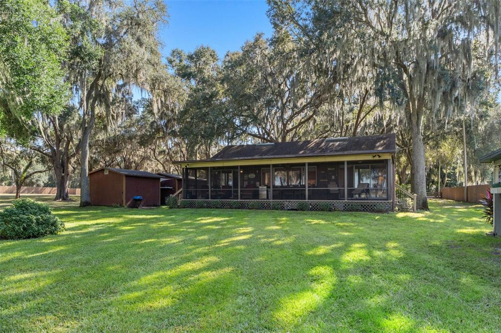 6185 West Riverbend Road Dunnellon, FL 34433 - Photo 6 of 49 a view of a house with a yard