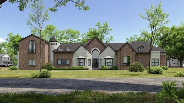 a front view of a house with a garden