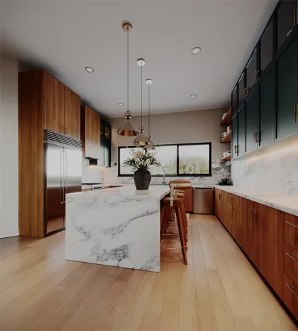 a kitchen with stainless steel appliances kitchen island granite countertop a table chairs sink and cabinets