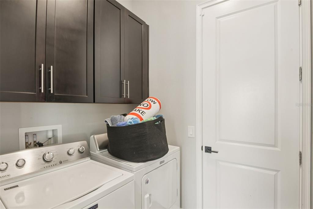 1440 Keystone Ridge Circle Tarpon Springs, FL 34688 - Photo 17 of 45 a utility room with dryer and washer