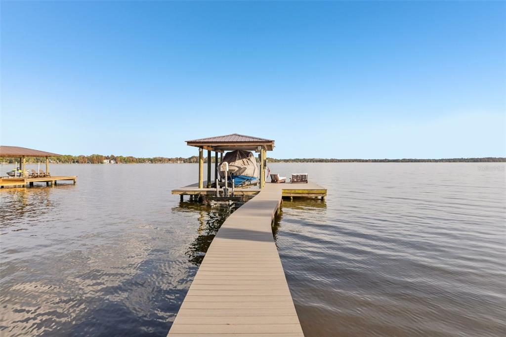 1440 Keystone Ridge Circle Tarpon Springs, FL 34688 - Photo 34 of 45 a view of a ocean with beach