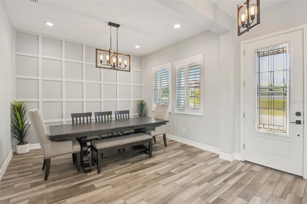 1440 Keystone Ridge Circle Tarpon Springs, FL 34688 - Photo 5 of 45 a view of a room with gym equipment and windows
