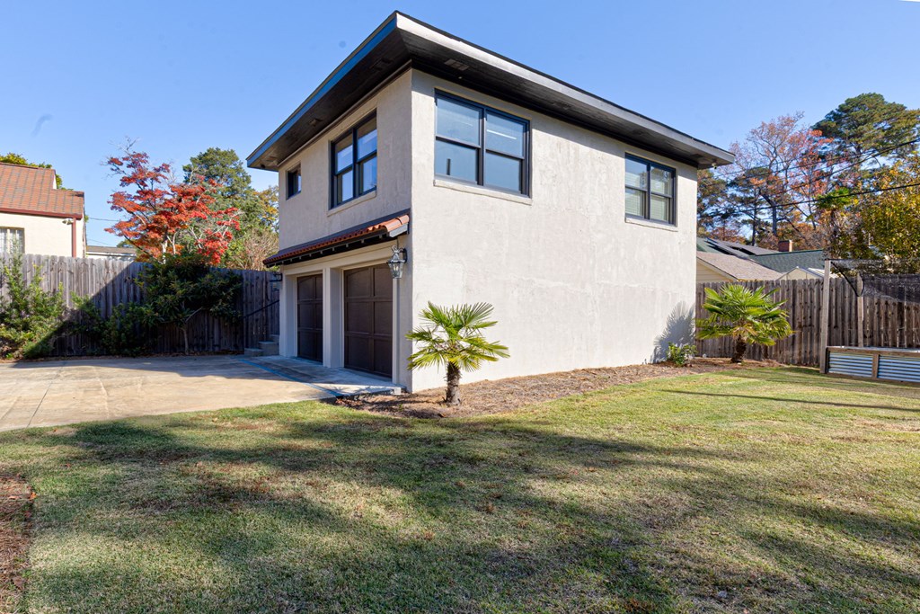 1400 17th Avenue Columbus, GA 31901 - Photo 11 of 50 a front view of a house with a yard