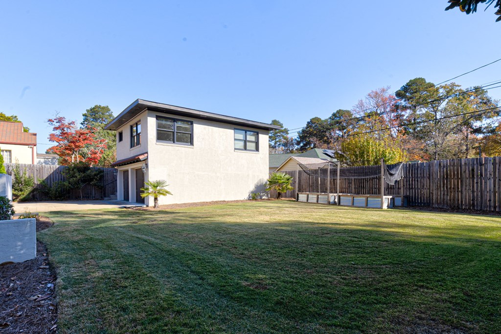1400 17th Avenue Columbus, GA 31901 - Photo 13 of 50 a front view of a house with a yard and garage