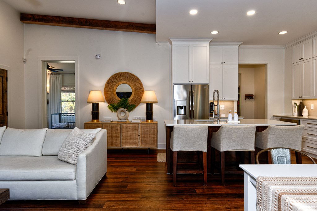 1400 17th Avenue Columbus, GA 31901 - Photo 19 of 50 a living room with couches a dining table kitchen view and kitchen view
