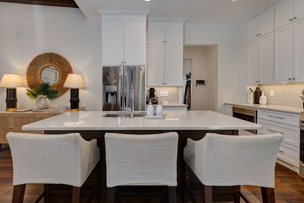 1400 17th Avenue Columbus, GA 31901 - Photo 20 of 50 a kitchen with stainless steel appliances granite countertop a table and chairs