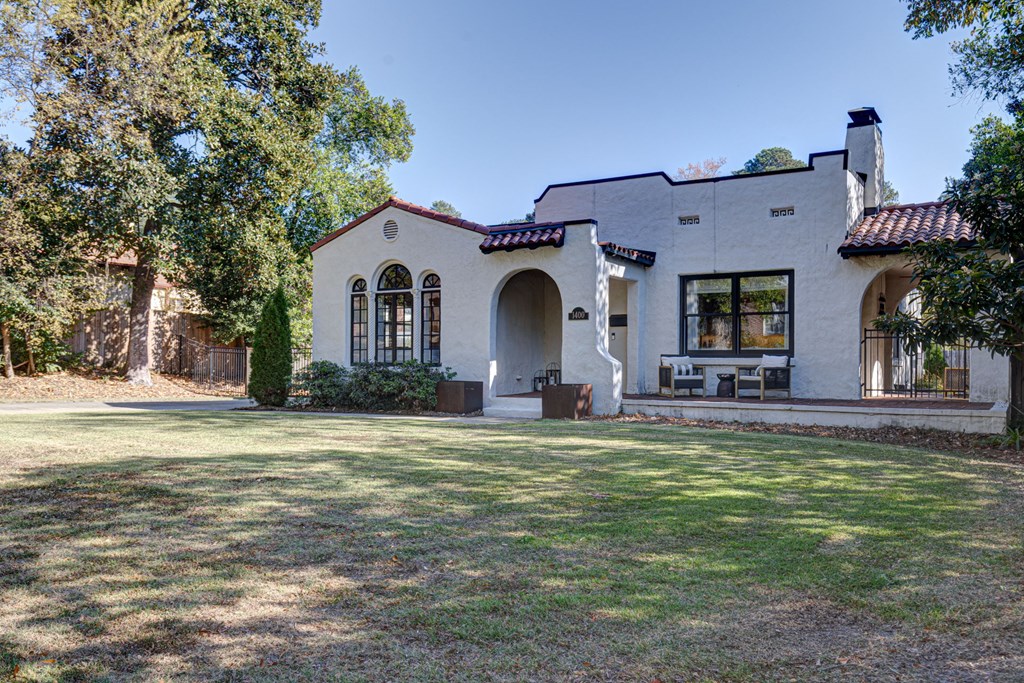 1400 17th Avenue Columbus, GA 31901 - Photo 2 of 50 a front view of a house with a garden
