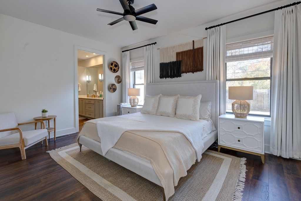 1400 17th Avenue Columbus, GA 31901 - Photo 26 of 50 a bedroom with a bed and a flat screen tv