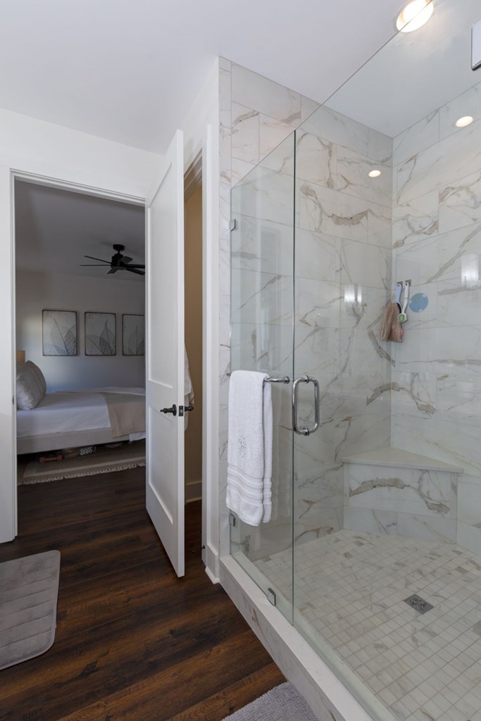 1400 17th Avenue Columbus, GA 31901 - Photo 33 of 50 a bathroom with a glass shower door