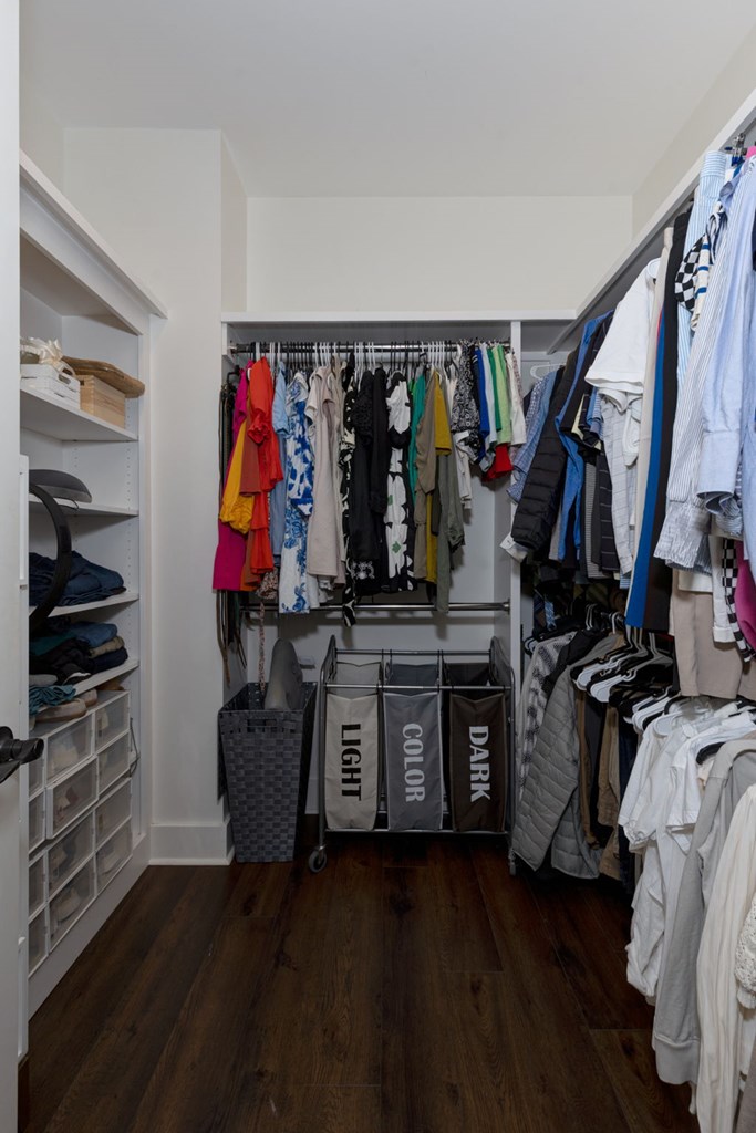 1400 17th Avenue Columbus, GA 31901 - Photo 34 of 50 a view of walk in closet with clothes and shoes