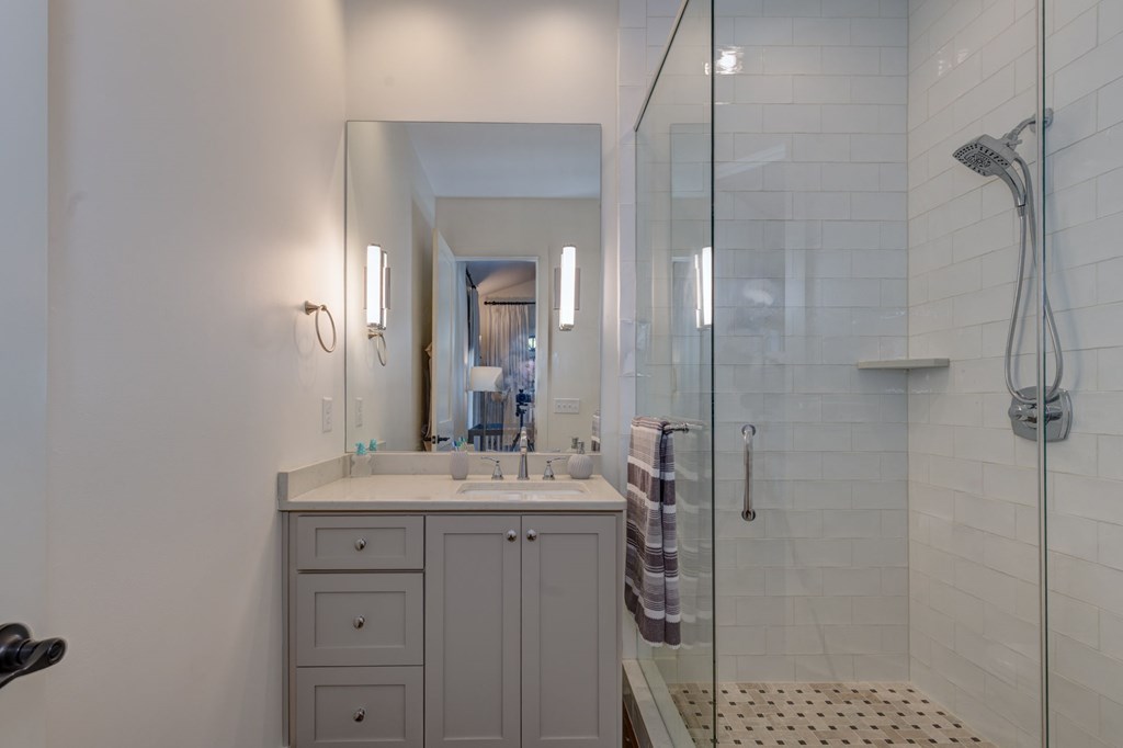 1400 17th Avenue Columbus, GA 31901 - Photo 37 of 50 a bathroom with a sink and a mirror