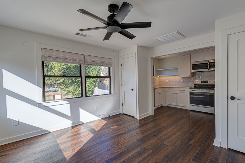 1400 17th Avenue Columbus, GA 31901 - Photo 45 of 50 a kitchen with wooden floors and appliances