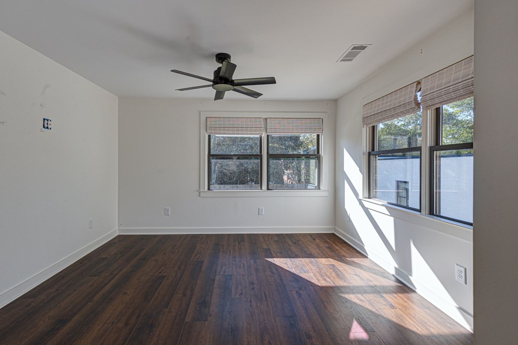 1400 17th Avenue Columbus, GA 31901 - Photo 46 of 50 a view of empty room with wooden floor and fan
