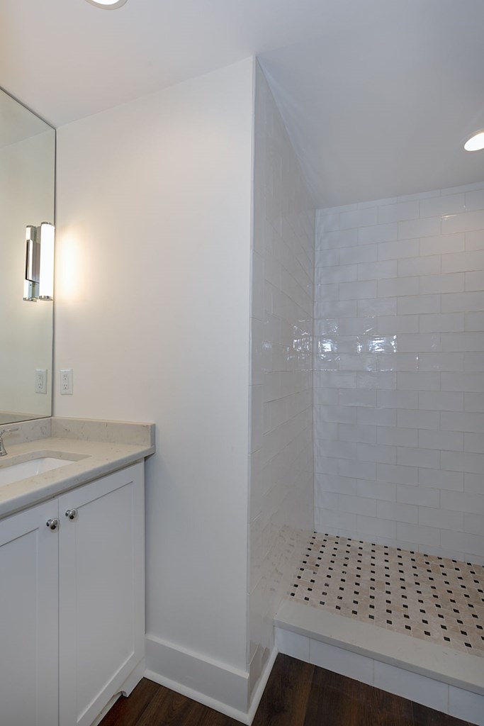 1400 17th Avenue Columbus, GA 31901 - Photo 49 of 50 a bathroom with a sink a toilet and a mirror