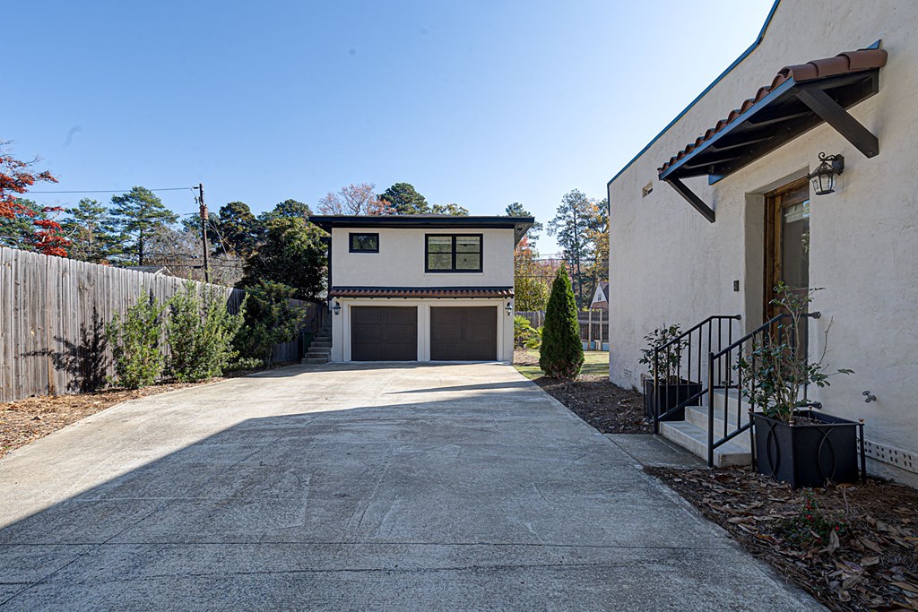 1400 17th Avenue Columbus, GA 31901 - Photo 6 of 50 a view of a house with a yard and potted plants