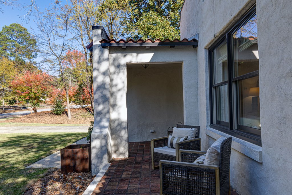 1400 17th Avenue Columbus, GA 31901 - Photo 8 of 50 a view of backyard with outdoor seating and plants