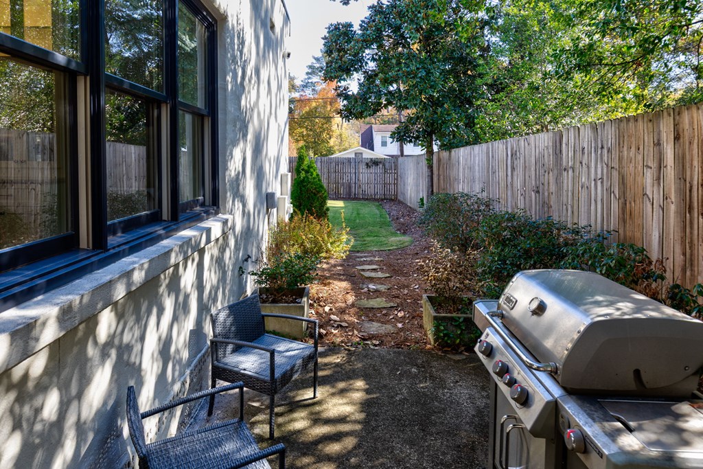 1400 17th Avenue Columbus, GA 31901 - Photo 10 of 50 a view of a porch with furniture and a yard