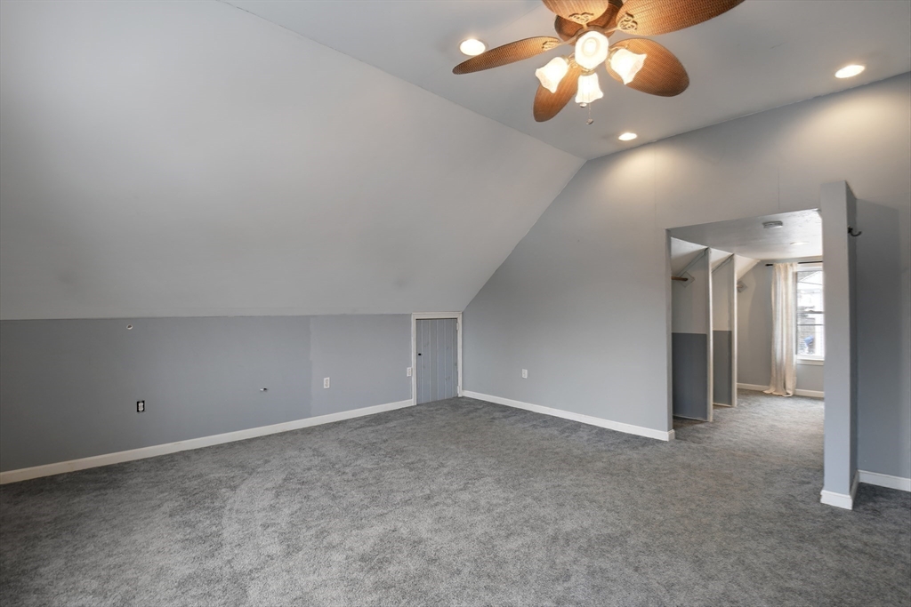 15 Myrtle Avenue Sterling, MA 01564 - Photo 22 of 33 en empty room with windows and fan