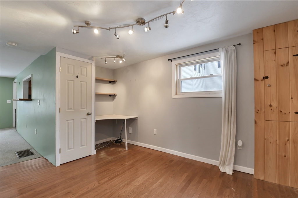 15 Myrtle Avenue Sterling, MA 01564 - Photo 5 of 33 wooden floor in an empty room with a window
