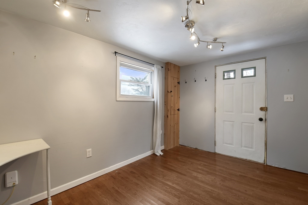 15 Myrtle Avenue Sterling, MA 01564 - Photo 6 of 33 a view of an empty room with wooden floor