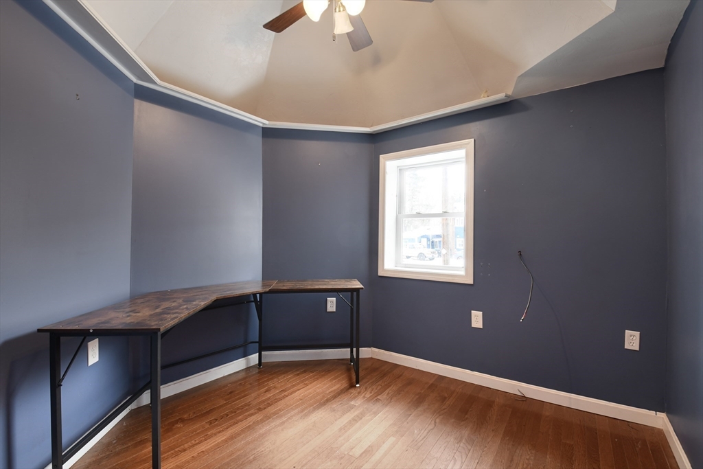 15 Myrtle Avenue Sterling, MA 01564 - Photo 7 of 33 a view of an empty room with window and chandelier fan