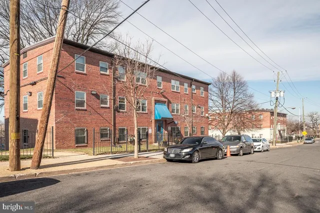 a view of a building with a street