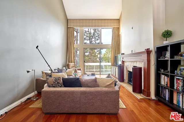 a kitchen with stainless steel appliances granite countertop a refrigerator and a stove