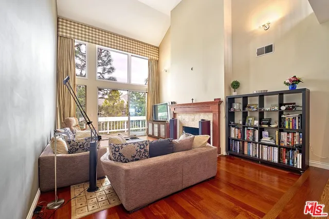 a kitchen with stainless steel appliances granite countertop a stove and a refrigerator