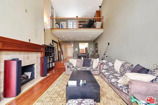 a kitchen with stainless steel appliances a refrigerator and a stove