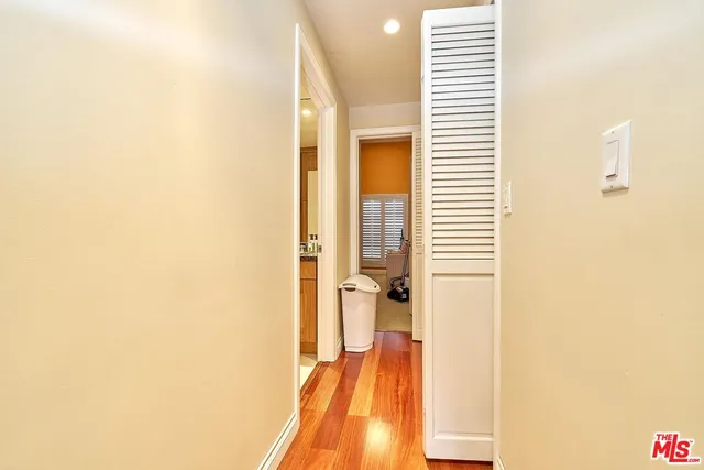 a bed sitting in a bedroom next to a fireplace