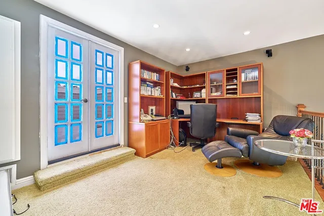 a view of a swimming pool with a lounge chairs