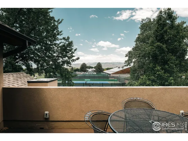 a aerial view of a house with a yard