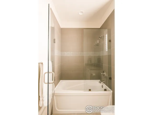 a bathroom with a bathtub and a sink