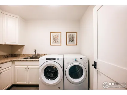 a view of house with outdoor space and lake view